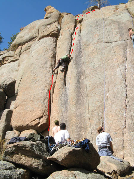 Ryan transitioning into the upper crack of the route.