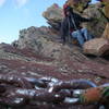 Anna scrambling to the anchors on south side of summit (thanks Bruce and Mike)