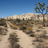 The old road. Trifling Rock and Laugh Rock are on the right of the road.<br>
Photo by Blitzo.