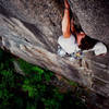 Greg Jackson in good jams on 'Nut Cracker' 5.9+/5.10-, Cathedral Ledge, NH.<br>
<br>
(scan)