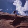 Joseffa Meir raps down from the summit of 'The Priest' in Castle Valley. Photo by Tony Bubb, 2003.