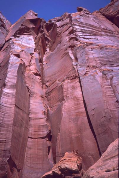 The unnamed 2-pitch corner can be seen in this shot just left of center. A keen eye can make out Dave Stewart rapping the climb on 2 ropes, up high. Photo by Tony Bubb, 2005.