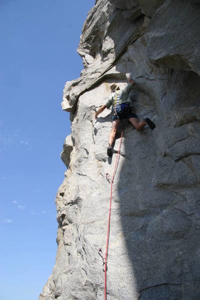 Midway through the crux of Shockwave, 5.10c.