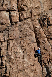 Tyson Dimmitt climbs "Get Lost" (5.7) at Benton Crags.