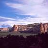 Looking back into Monument Canyon from the base of a wall. "The Kissing Couple" is the most prominant formation in this view. Photo by Tony Bubb, 2005.