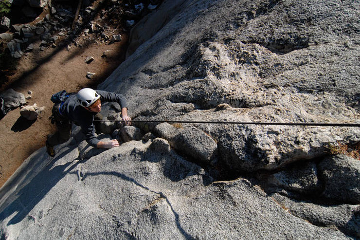 Tyson Dimmitt climbs "Rodeo Rider" at Horseshoe Slabs