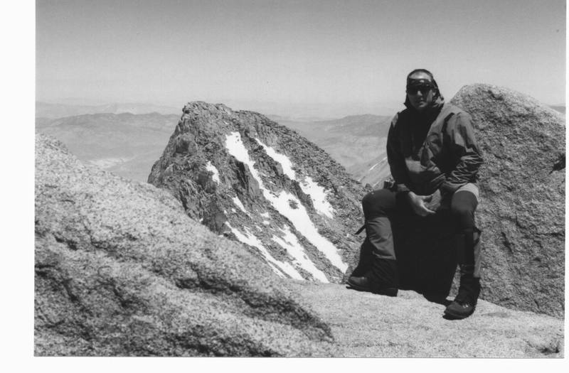 On the summit of North Pal 4 Jul 96 after a glorious solo ascent.  Mt. Sill is the peak in the background.