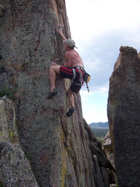 Action photo.  Shano climbing out of the Tombstone Pit.