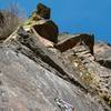 The roof on the Left is The Dragon 5.12? <br>
Roof on Right is Buddha's Belly 5.11a