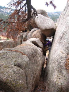 The walk off from the climbs on the right side of the Valley Massif's SE face involves threading this exciting chimney.  Strapping men and large-chested women beware!