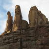 This is the group of three smaller towers to the East North East of Tibia (Resurrection Tower).  Hermits Hovel is the center of the three.  The route climbs the north face which is the opposite side that is shown in this photo.