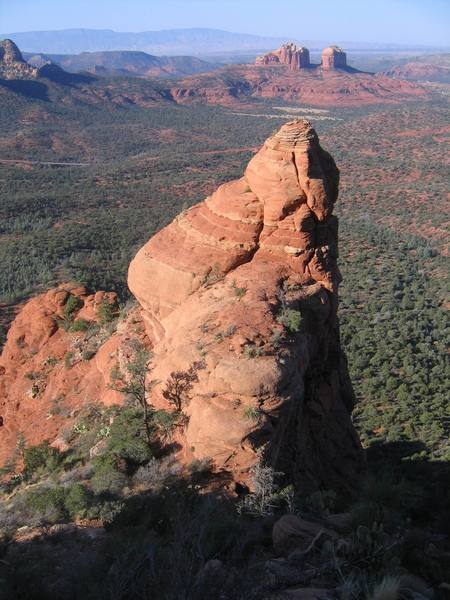 This spire is found below the start of the Sedona Scenic Cruise.  It's an easy scramble from the notch to the top and is fun to do if you've got extra time.  Two Sedona spires in a day!  Yipee!