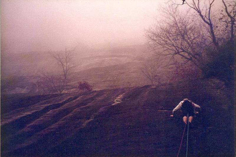 Starting up the run-out 1st pitch into a sea of mist... circa 1994