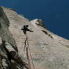 The steep 6b headwall fist crack of Sinestro Total. Many will find this to be the crux. A nearly 70m pitch!