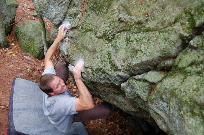 Crazy-eyed Mike behind the Welcome Boulder.  Photo by Bryce Dalhaus