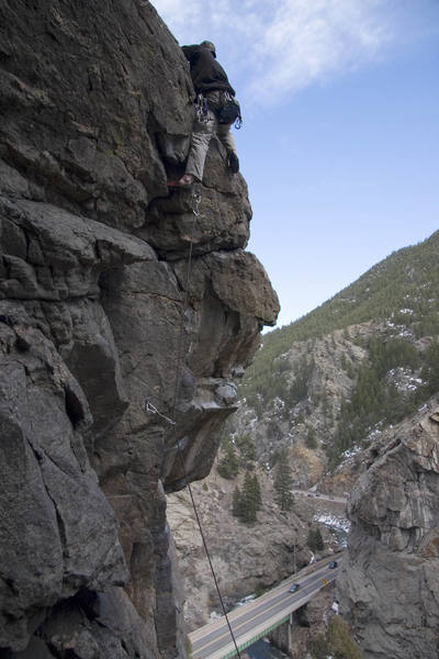 Rick climbing over the roof.<br>
<br>
Photo: Dave Fiourcci.