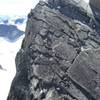 Midway through the summit traverse to the descent of Bugaboo spire.