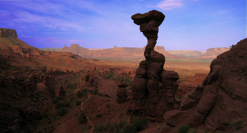 The Cobra and Castle Valley towers in the background seen in the morning after climbing Ancient Art in May 2007