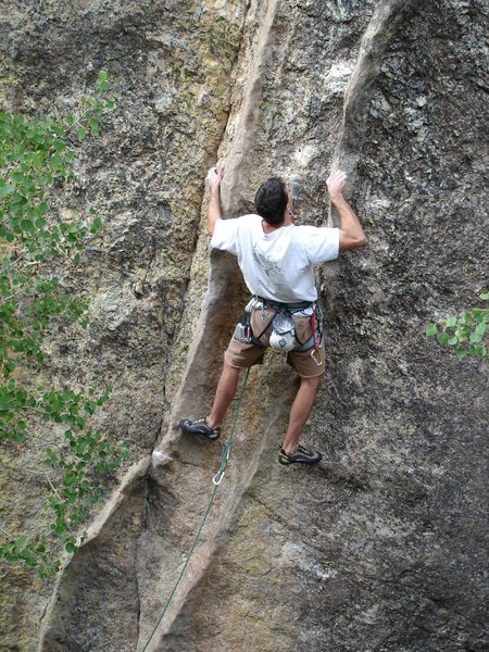 The lad still keeping it together while experiencing "Climba Sutra" as he slithers between "Ladies in Love".