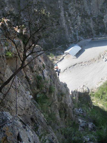 Marga Powell on the arete on the fourth pitch.  From here, she will climb up and traverse left to the belay.<br>
<br>
Bring some longer runners and skip some clips to keep down rope drag if you're leading this pitch.