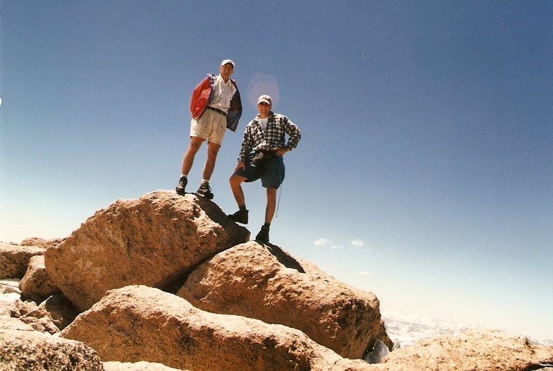 At the top of Long's Peak, ca 1998.  Really shoulda had crampons and an ice axe for self-arrest that day, but we stuck to our turnaround time anyway.  Great day.