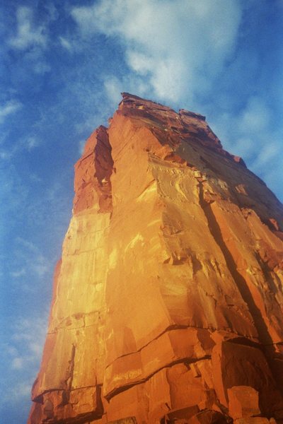 Castleton Tower, early morning in august, with the North Chimneys route on the left, north face on the right.