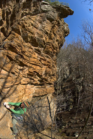 Pulling the lip of the second roof, with the third looming above. Photo by Andy "Steenky" Chasteen