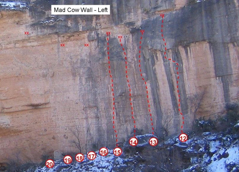 The left end of the Mad Cow Wall.  The right edge of the "Hueco Cave" is visible on the left edge of the photo.  There isn't a clear delineation between these two areas.<br>
<br>
12. Black Plague, 5.13b, 4 stars<br>
13. Big Daddy, 5.12d<br>
14. Rabid Dave, 5.12b<br>
15. Die Hardral, 5.12a<br>
16. Shakka, 5.11c<br>
17. Cutter, 5.11c<br>
18. Mad Cow, 5.12b<br>
19. Anthrax Letters, 5.12d<br>
20. Ebola, 5.13a