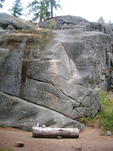 Deception Crack is the obvious right-to-left crack above the white colored rock.  Visible to the left of deception and to the right of the moss is a fun 5.7-ish toprope.  Climb through the horizontal cracks on the prow.  