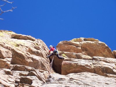 Katie O'Brien stemming the roof halfway up.