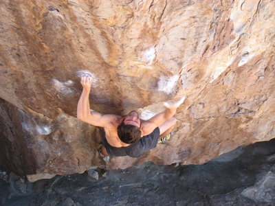 The crux move, going for the pinch.  This thing is hard to latch.