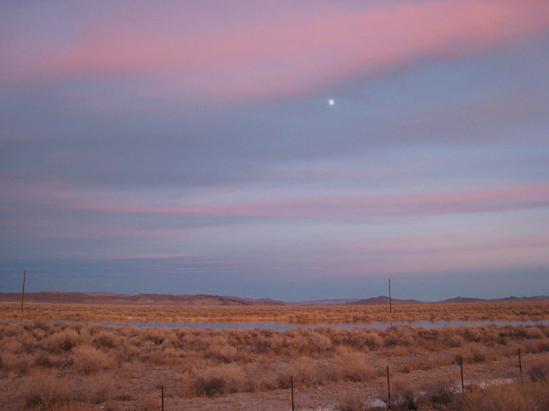 Moon over central Nevada somewhere on our way from Red Rocks back to my former home in Reno. <br>
<br>
Thanksgiving 2007