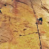 The spectacular 1st pitch, Greg Jackson climbing<br>
<br>
(scan) 