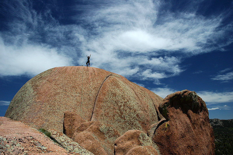 Liz stands on top of the Rat Brain on Poland Hill on a breezy April day.