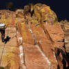 Mark raps down Fine Line at the end of a long day climbing great cracks in Eldo