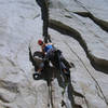 Joy Schneiter climbing the first pitch of Igor Unchained.