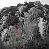 Applied Magnetics: Old & New<br>
<br>
According to conversations with Tom Adam and others, the original line taken by Chouinard & party up "Applied Magnetics" followed a shallow, intermittent seam all the way to the top of the cliff (shown as the red line on the right in this photo).  The route that is now universally climbed steps left from Applied Magnetics and incorporates the protection bolt and face climbing on the top of "Brush Up Your Shakespeare" (shown as the red dots in the middle).  Brush Up is actually a variation of Rockoco.  Brush Up's line steps boldly right from the alcove below the overhang on Rockoco.  After traversing for 30 feet, the line turns upward and climbs delicate face moves past a bolt (shown as the yellow dots on the left).