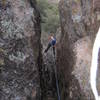 Nice boulder you can throw some webbing around for top-roping and back up with a hex in a crack. 