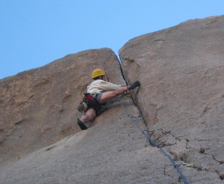 Good friend, Hogan, placing the last piece before the crux on Bird Of Fire (10a) at Isles In The Sky, Split Rock.