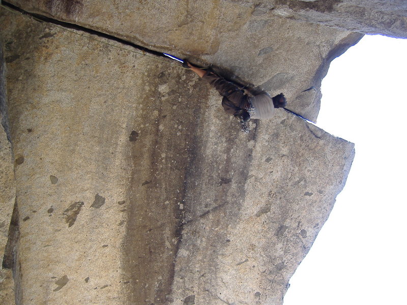 Bald spot Bill rock scaling the mountain cliff of Separate Reality