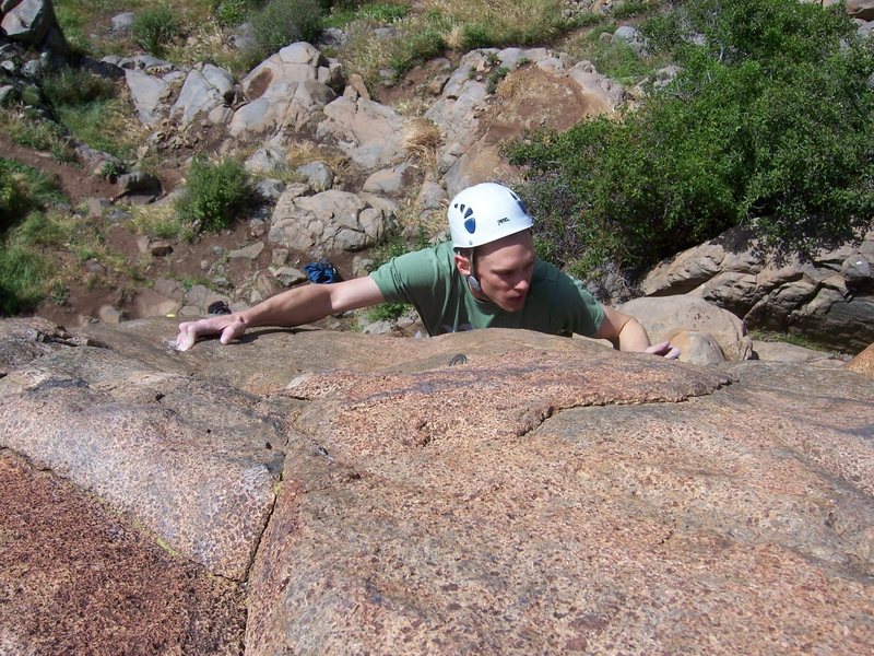 Pullin through the last crux move on Mighty Monger, Mission Gorge.<br>
<br>
Also pulled the move sans the right hand hold accidentallly.  Made it solid 5.11.