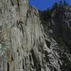 Theo moving through the upper crux on a beautiful spring day.