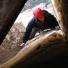 Clay approaching the huge chockstone on Frogland