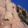 Tony high up in 5.9 territory on Zipcode (5.11-) on Eldo's West Ridge This is well above the crux and is great climbing on great rock with great protection. Photo by Stefanie VanWychen, 3/08.