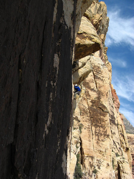 Climber on 2nd pitch of Black Magic just below the belay.