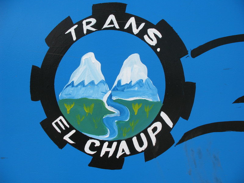 Close-up of the logo on one of the buses from Machachi to El Chaupi showing a stylized version of the Illinizas.