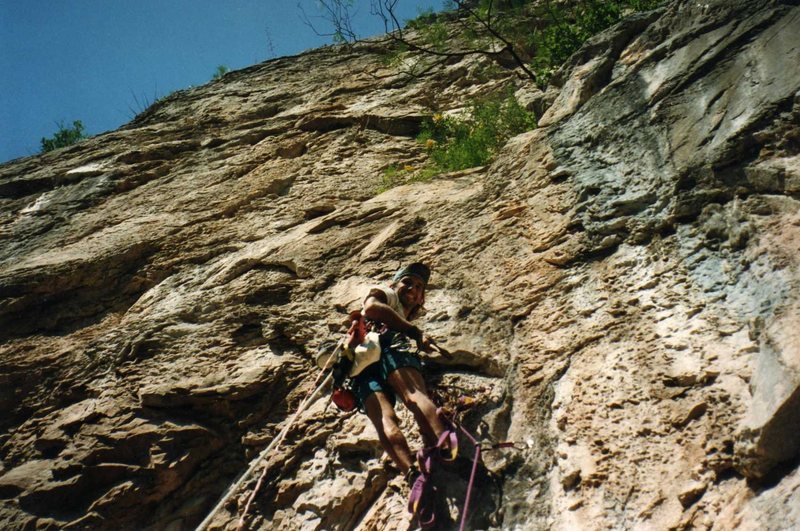 Hank bat hooking and drilling on the crux pitch.  