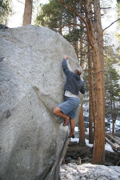 Working up and along the rail on Pull Down Like De Jesus, V4