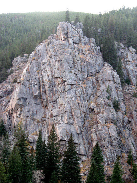 I believe this is the overall rock. It is visible on the roadway just after the s-turns coming from Idaho Springs.<br>
<br>
The sporty lines are on climber's left of this rock and are good quality.<br>
<br>
This rock looks a lot bigger from the road than it really is.