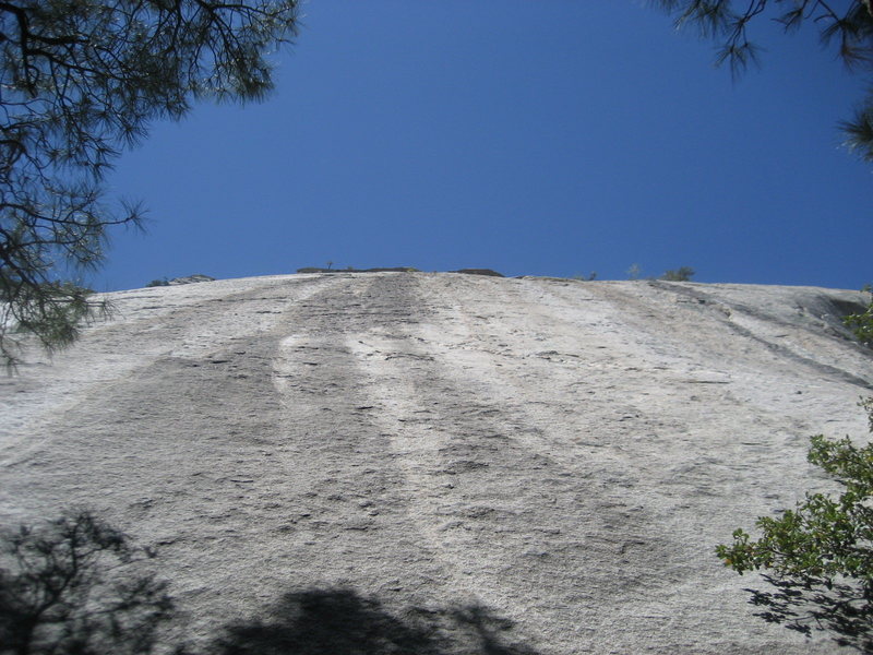 Looking up at 300+ feet of highly textured slab. This photo is roughly below the route "Bear Walk"